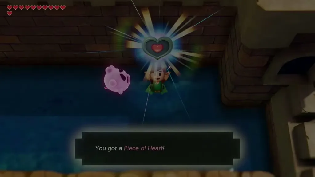 Link holding up a Piece of Heart on the moat floor Link holding up a Piece of Heart on the moat floor