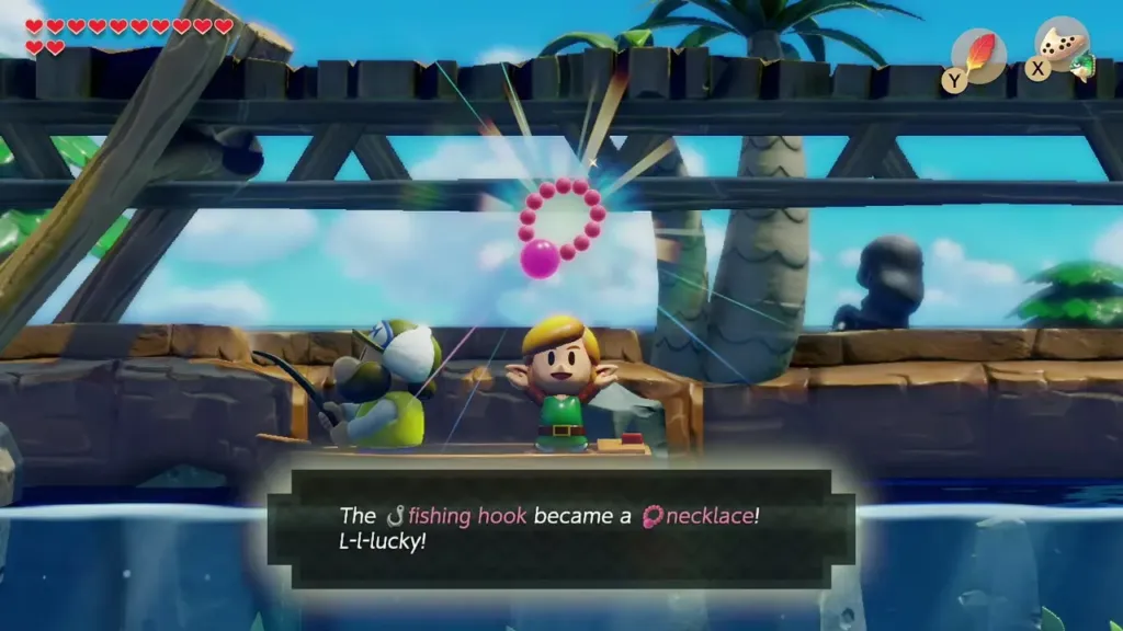 Link in the boat holding up the pink Necklace with the fishing-hook-became-a-necklace message Link in the boat holding up the pink Necklace with the fishing-hook-became-a-necklace message