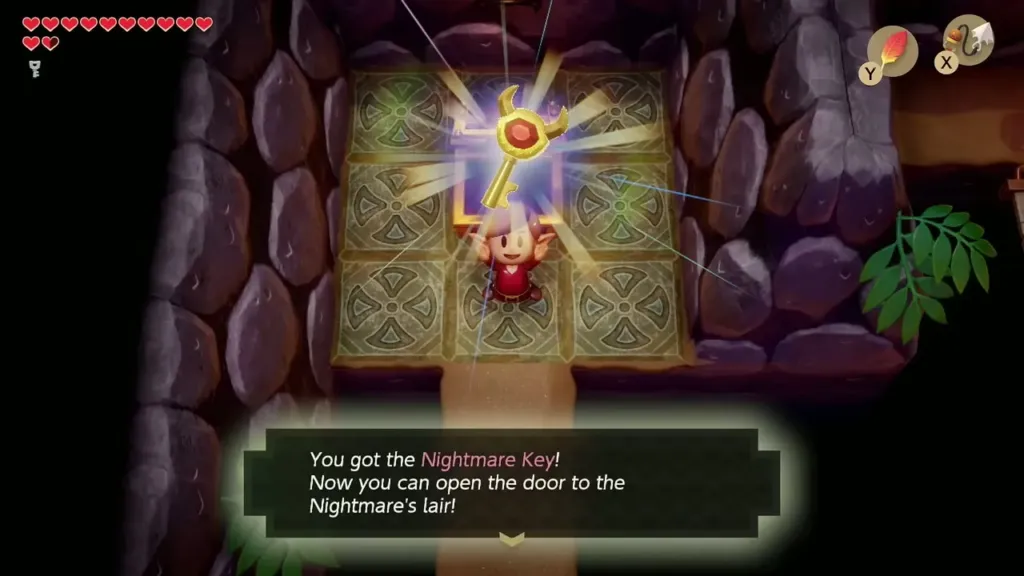 Link holds up the Nightmare Key with the message that he can open the door to the Nightmare's lair Link holds up the Nightmare Key with the message that he can open the door to the Nightmare's lair