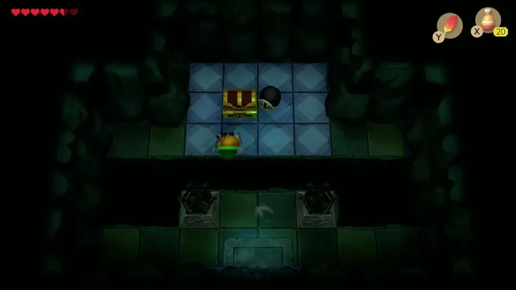 Link reaching the chest on the lit platform with the beetle beside it Link reaching the chest on the lit platform with the beetle beside it