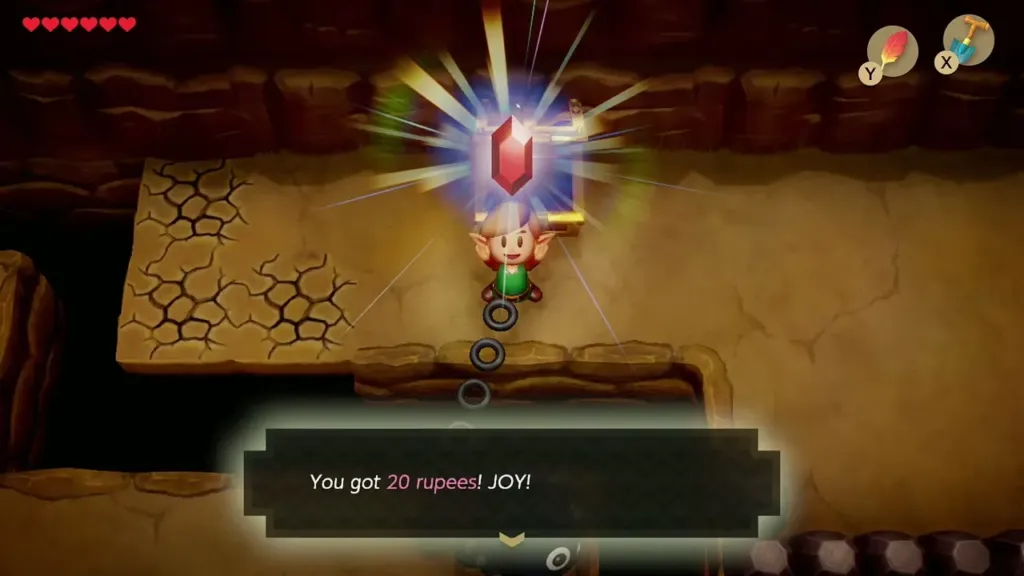 Link holding up the 20 rupees from the cave chest with the item message shown Link holding up the 20 rupees from the cave chest with the item message shown