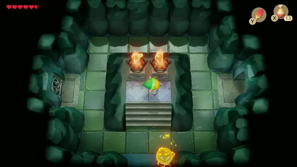 Link in the room with both torches burning after using Magic Powder Link in the room with both torches burning after using Magic Powder