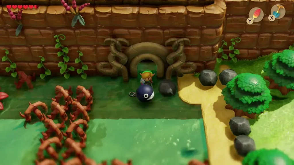 BowWow waiting outside the Bottle Grotto door as Link goes in BowWow waiting outside the Bottle Grotto door as Link goes in
