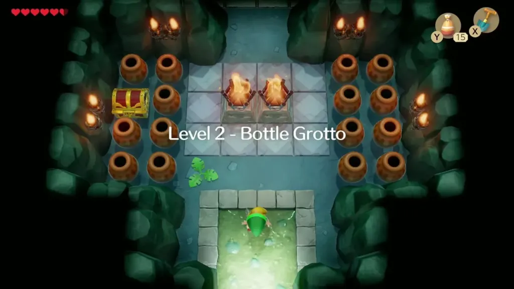 Bottle Grotto entrance room with pots, a chest and two torch pedestals Bottle Grotto entrance room with pots, a chest and two torch pedestals