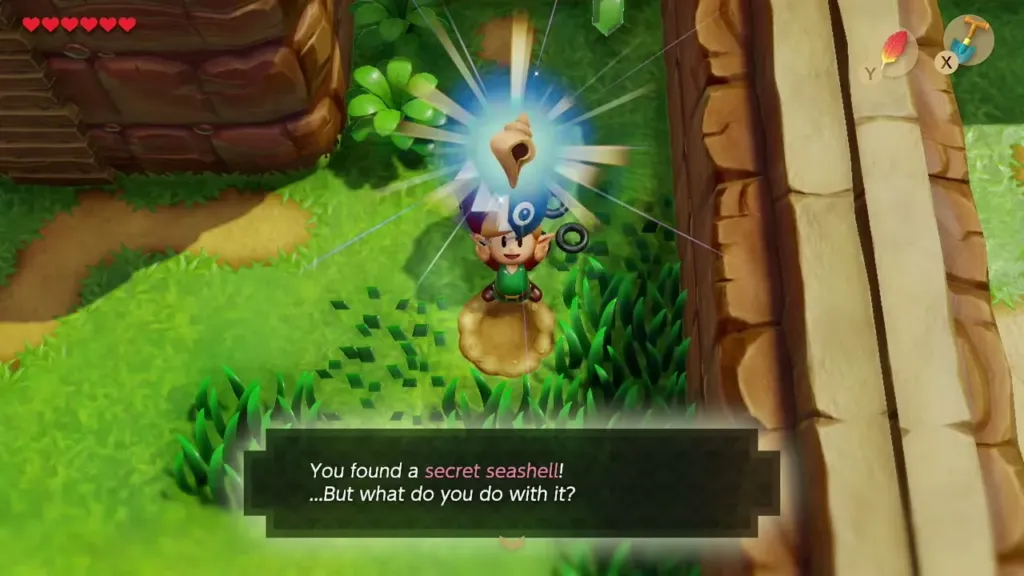 Link holding up the Secret Seashell dug up by the cliff with the item message shown Link holding up the Secret Seashell dug up by the cliff with the item message shown
