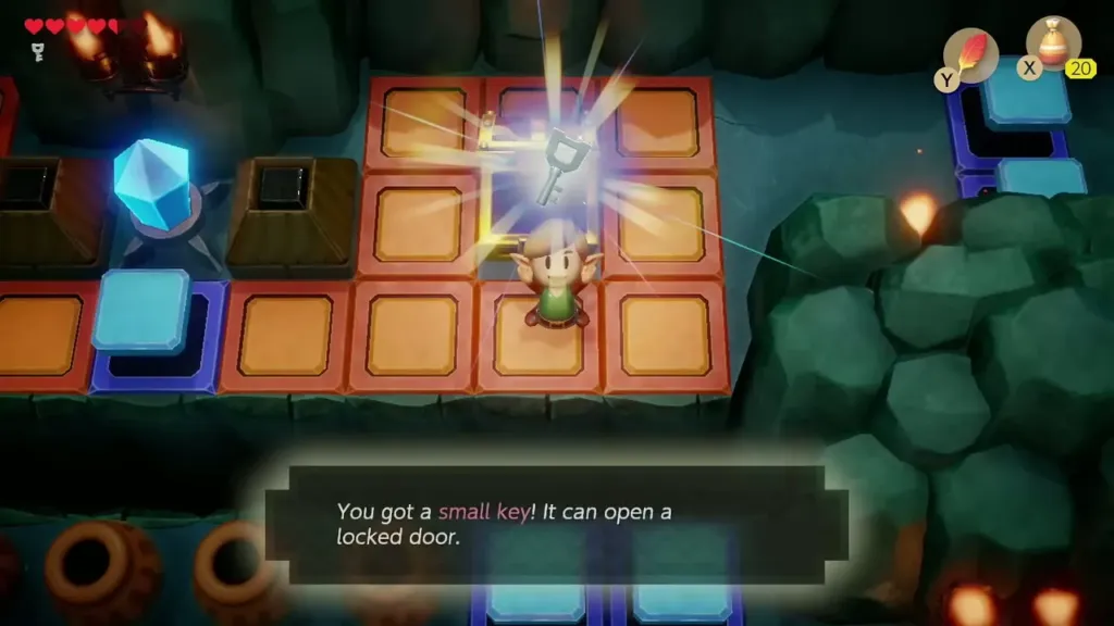 Link holding up a small key in the crystal-switch room Link holding up a small key in the crystal-switch room