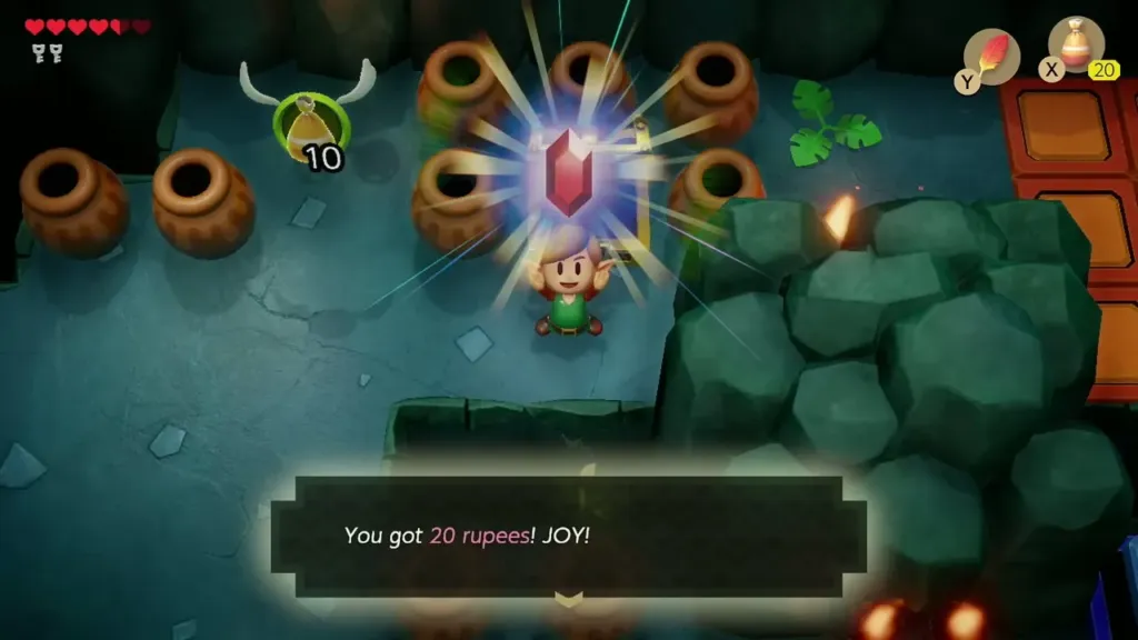 Link holding up a red 20 rupee gem from the chest with the message box Link holding up a red 20 rupee gem from the chest with the message box