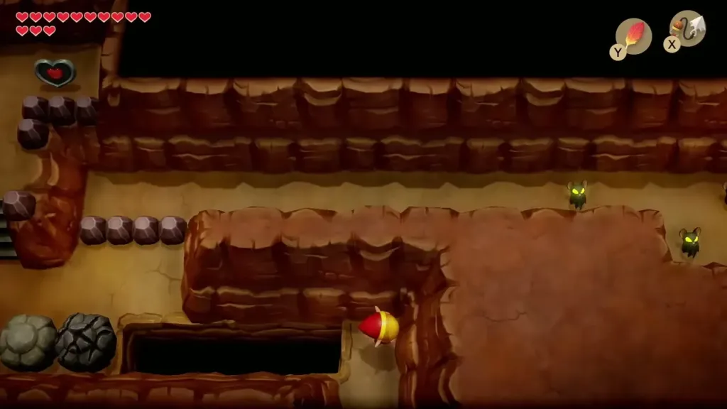 Link in the dark cave with a heart piece on the far ledge Link in the dark cave with a heart piece on the far ledge