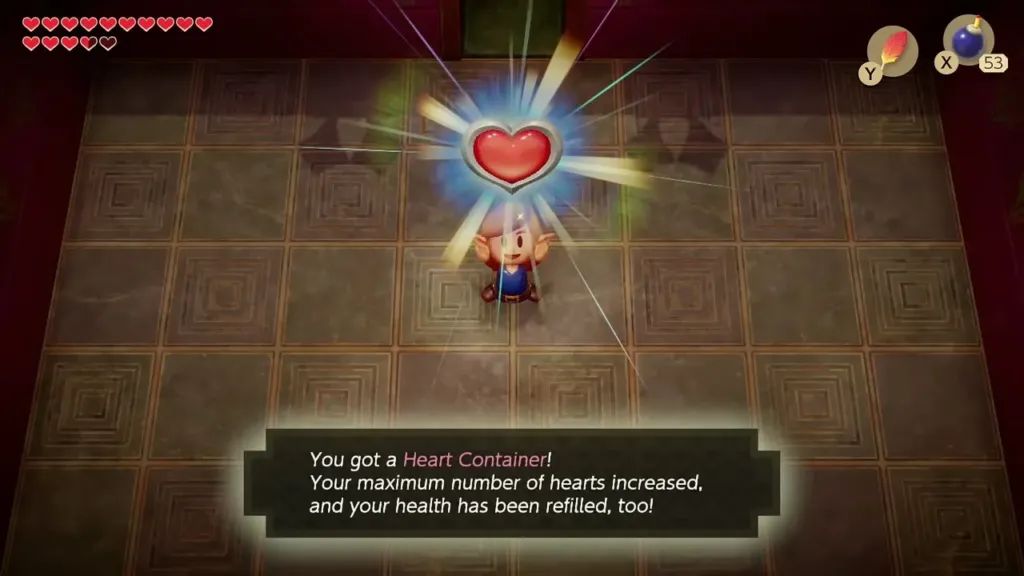 Link holding up the Heart Container with the message that his maximum hearts increased Link holding up the Heart Container with the message that his maximum hearts increased