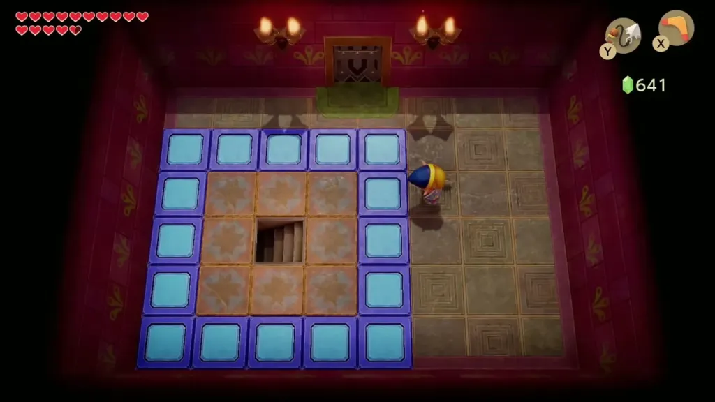 Room with blue floor tiles around a staircase down Room with blue floor tiles around a staircase down