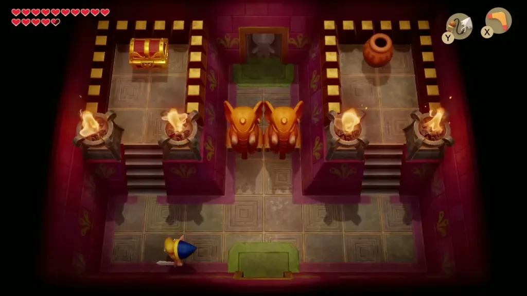 Room with two elephant statues and a chest on each side Room with two elephant statues and a chest on each side