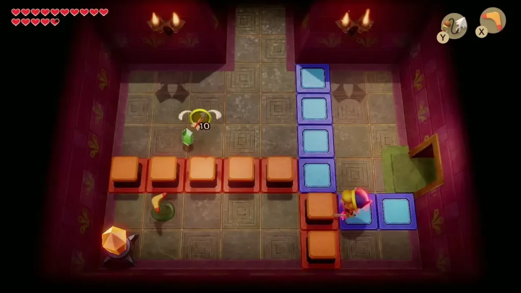 Link crossing lowered blue blocks in the switch room Link crossing lowered blue blocks in the switch room