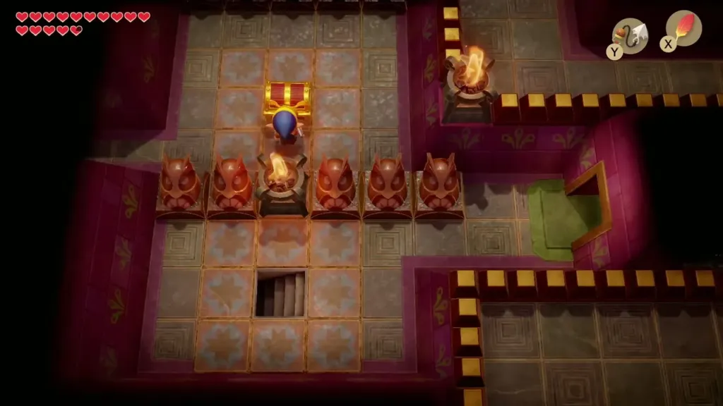 Link at a chest in a row of owl statues Link at a chest in a row of owl statues