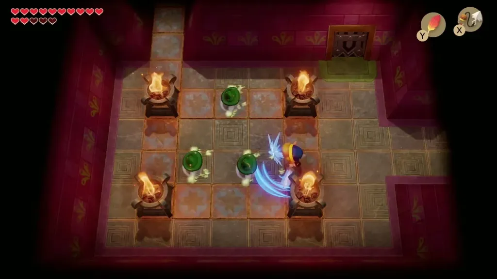 Link slashing Green Zols in the room with four torches Link slashing Green Zols in the room with four torches
