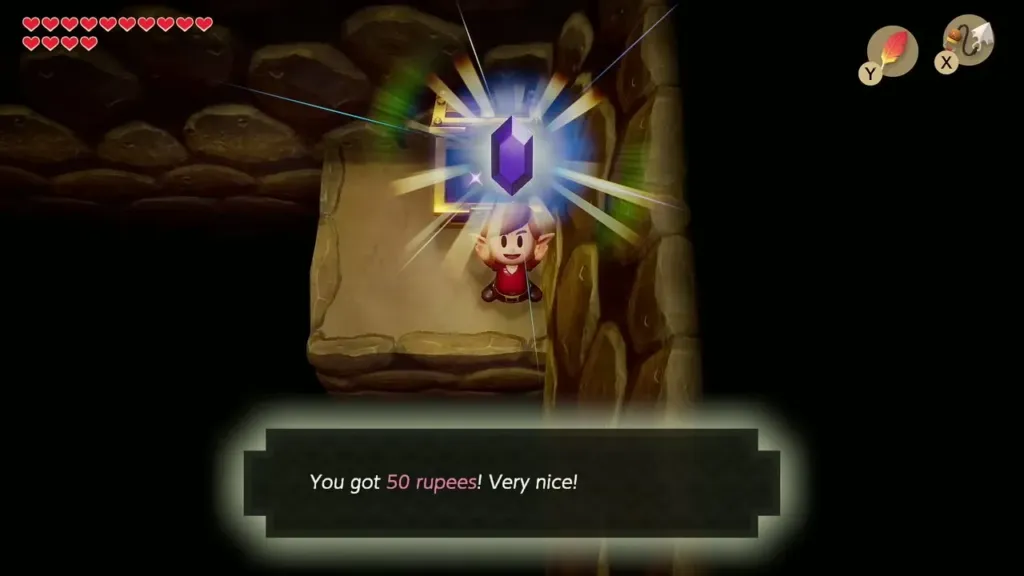 Link holding up 50 rupees from the chest in the cave Link holding up 50 rupees from the chest in the cave
