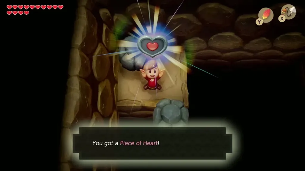 Link holding up a Piece of Heart in the cave Link holding up a Piece of Heart in the cave