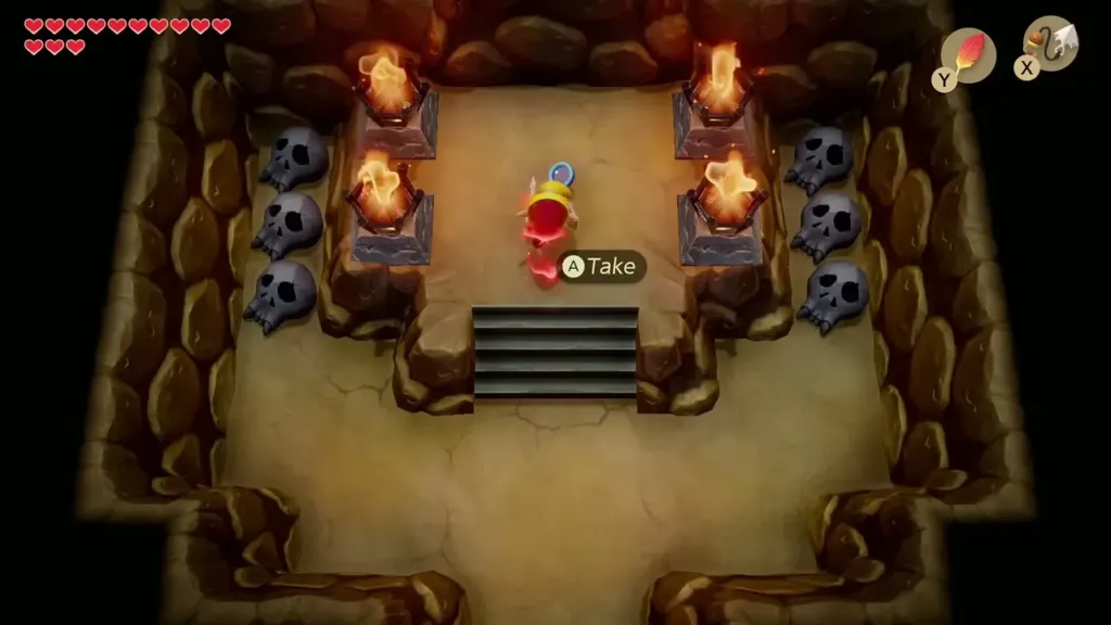 Link at the pedestal between flaming braziers and skull statues Link at the pedestal between flaming braziers and skull statues