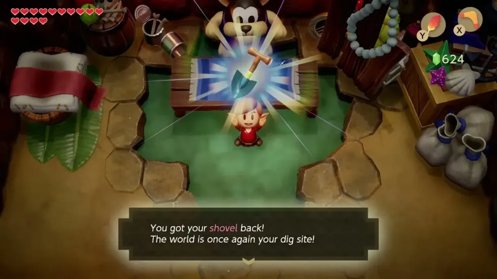 Link holding up his Shovel with the box saying he got it back Link holding up his Shovel with the box saying he got it back