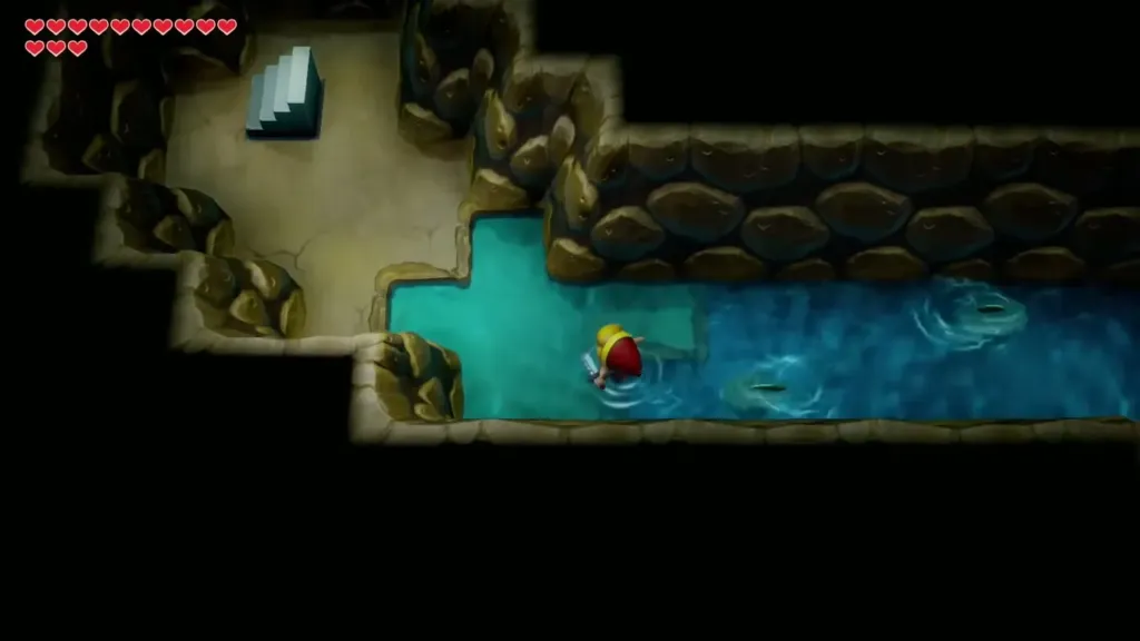 Link swimming toward the stairs at the end of the tunnel Link swimming toward the stairs at the end of the tunnel