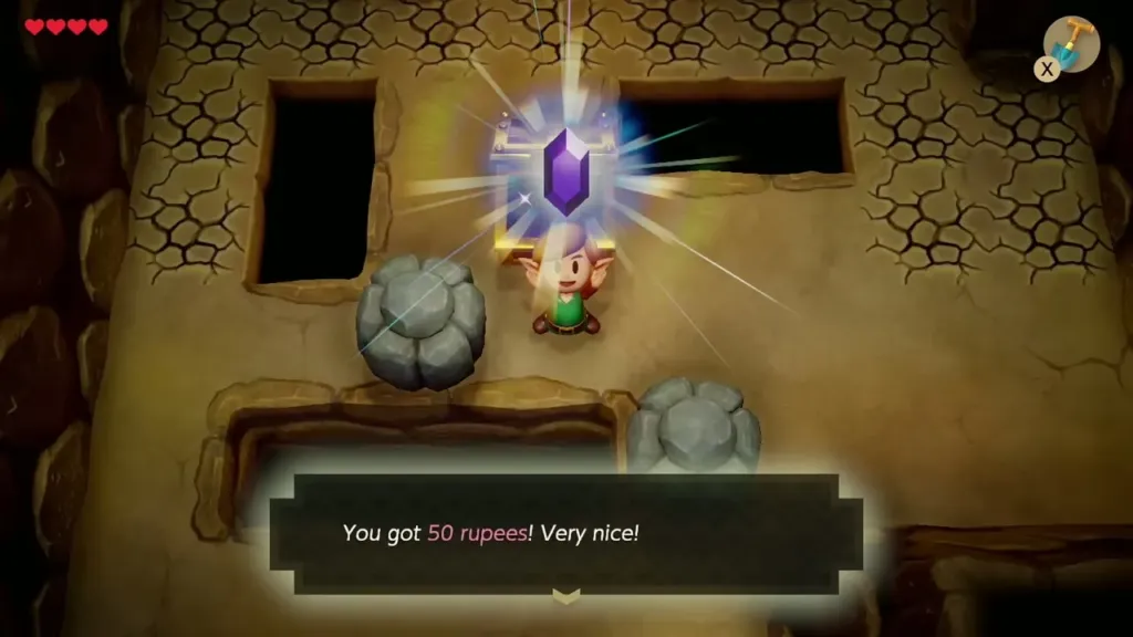 Link holds up a 50 rupee prize in the cave Link holds up a 50 rupee prize in the cave