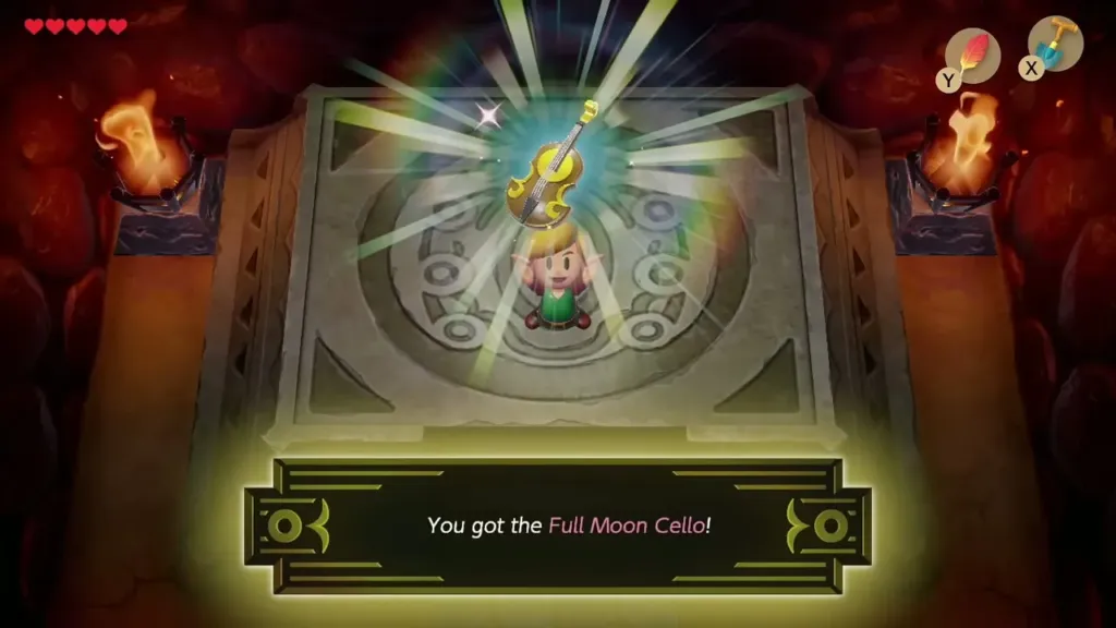 Link holding up the Full Moon Cello with its name box Link holding up the Full Moon Cello with its name box