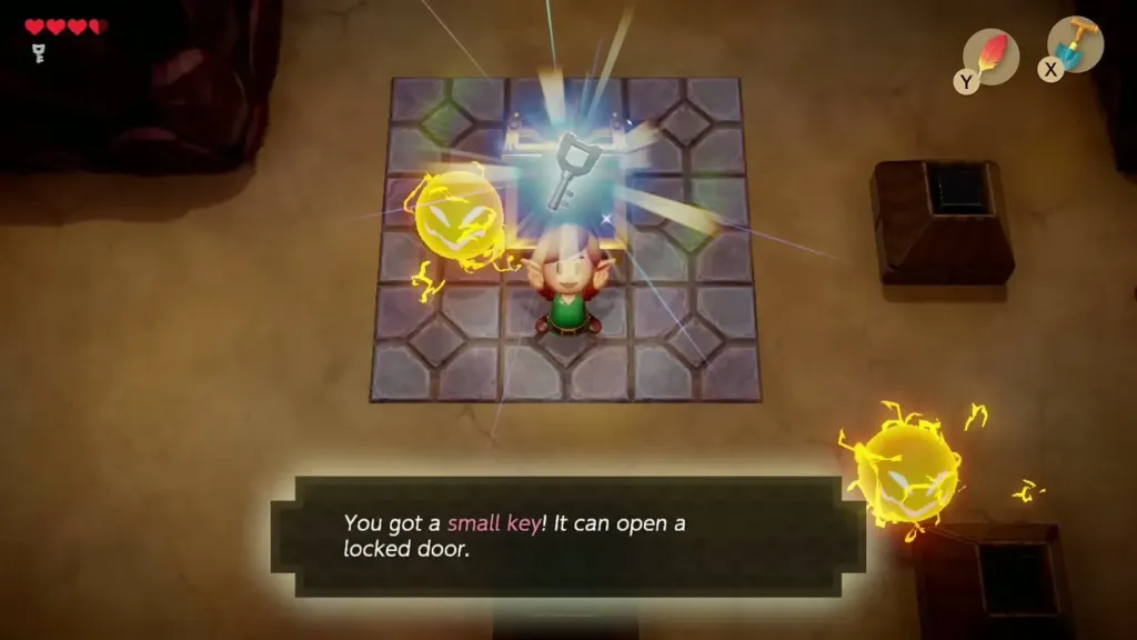 Link holding up the third Small Key beside the circling Spark Link holding up the third Small Key beside the circling Spark