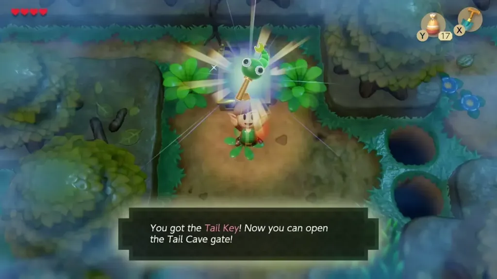 Link holding up the Tail Key with its message box Link holding up the Tail Key with its message box