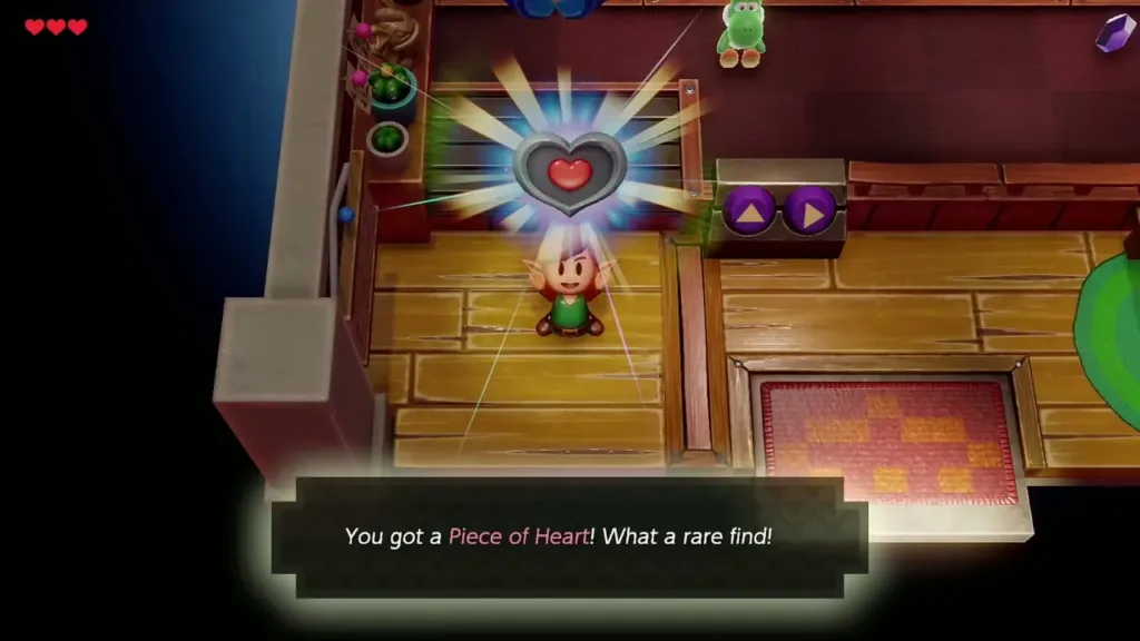Link holding up a Piece of Heart won at the Trendy Game with the message box shown Link holding up a Piece of Heart won at the Trendy Game with the message box shown