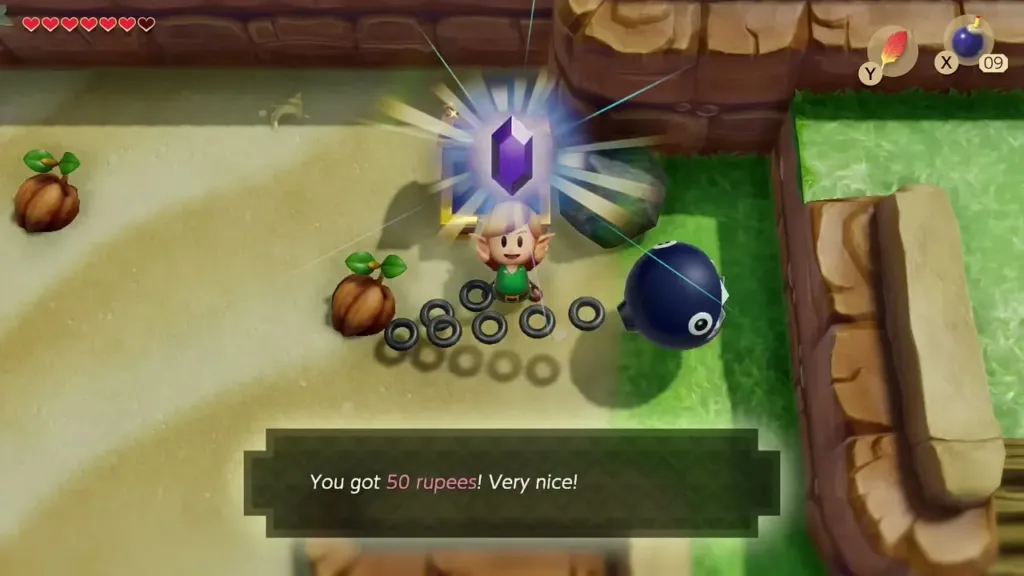 Link holding up the 50 rupees from the beach chest, with the item message on screen