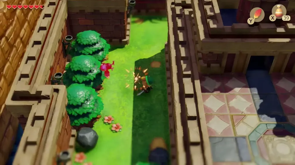 Link striking a crow enemy beside the west castle wall