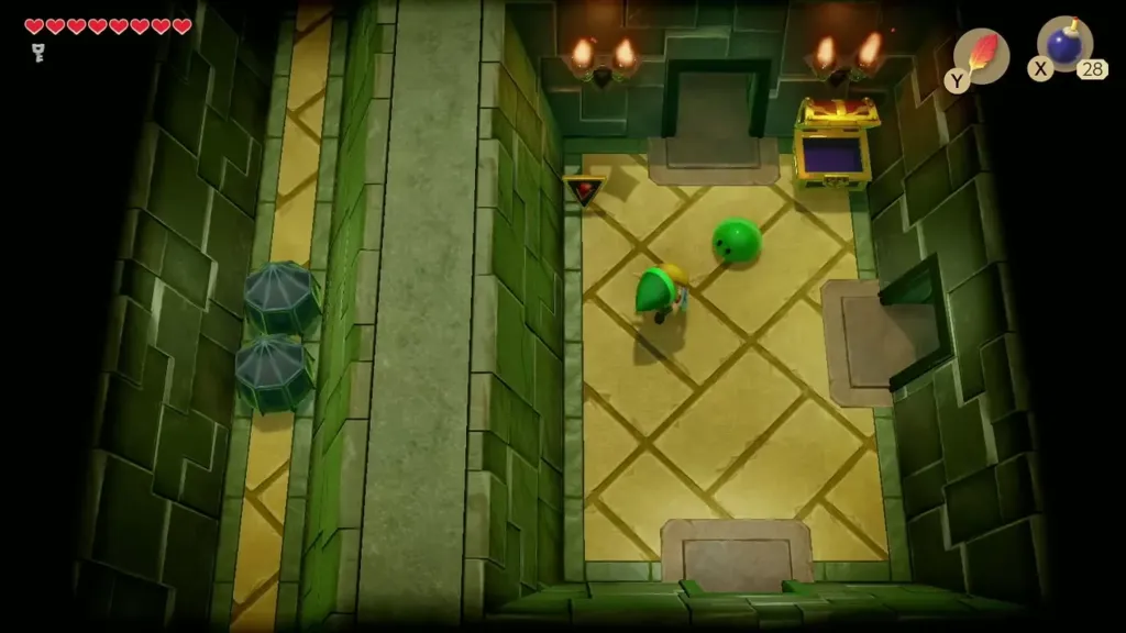 Link facing a green Zol that dropped from the trapped chest in Key Cavern