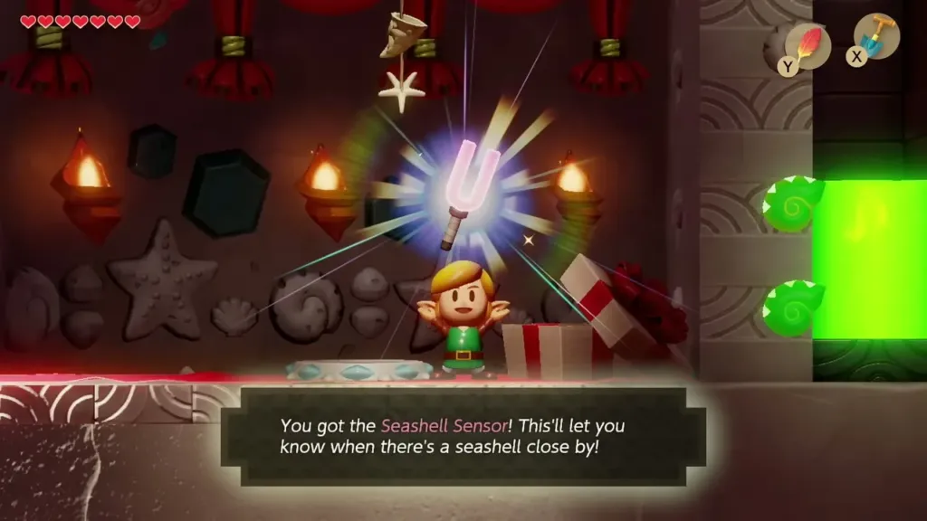 Link holding up the Seashell Sensor at the Seashell Mansion, with the item message on screen