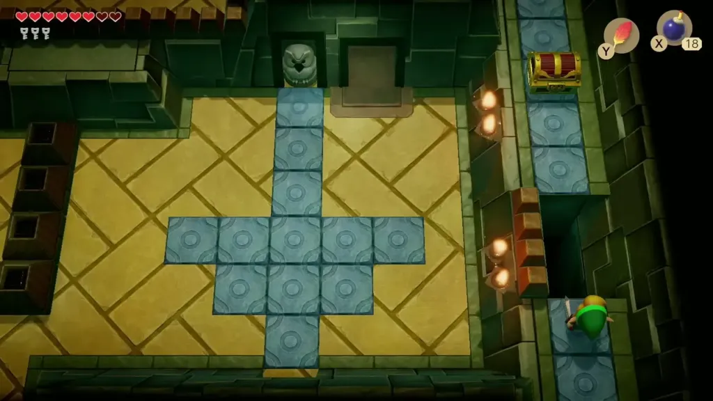 Link heading up the blue walkway toward the chest in Key Cavern