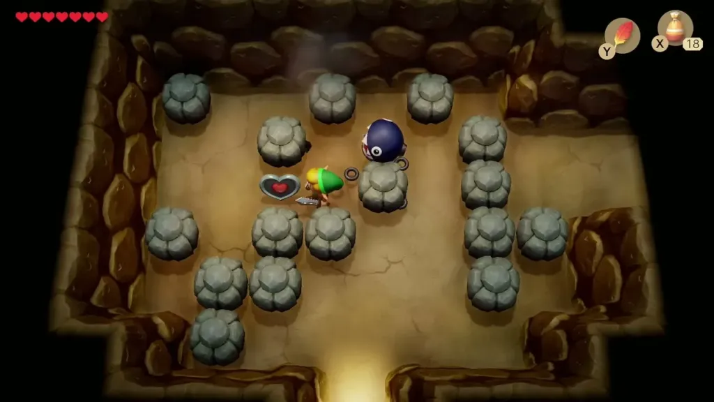Link reaching the Piece of Heart on the left of the rock cave