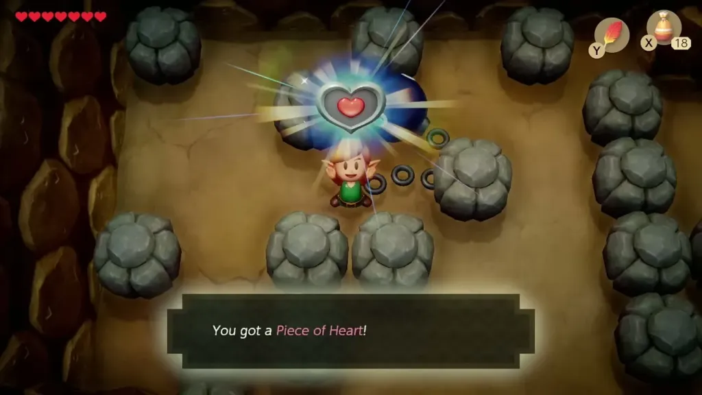 Link holding up the Piece of Heart in the rock cave, with the item message on screen