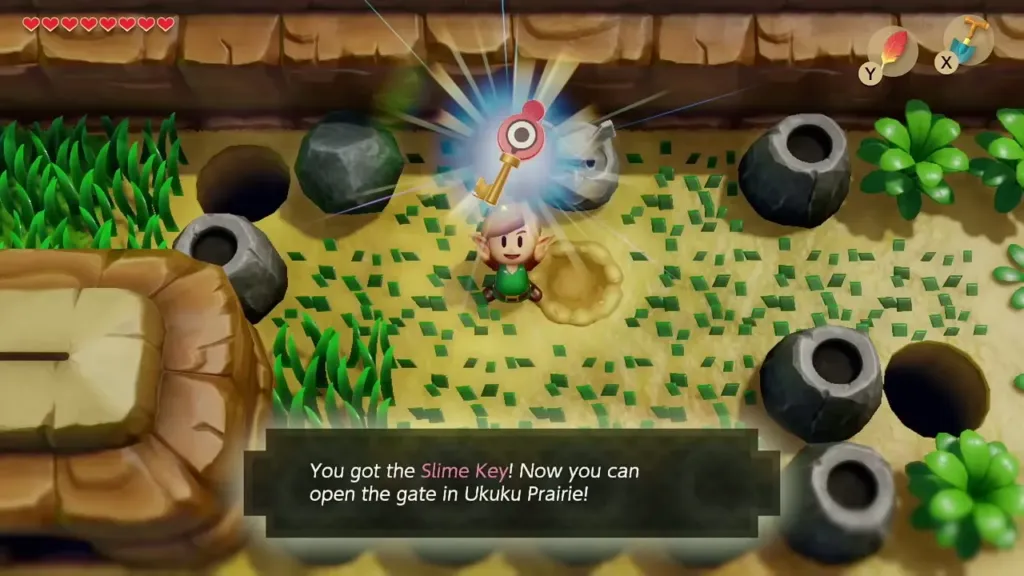Link holding up the Slime Key in Pothole Field