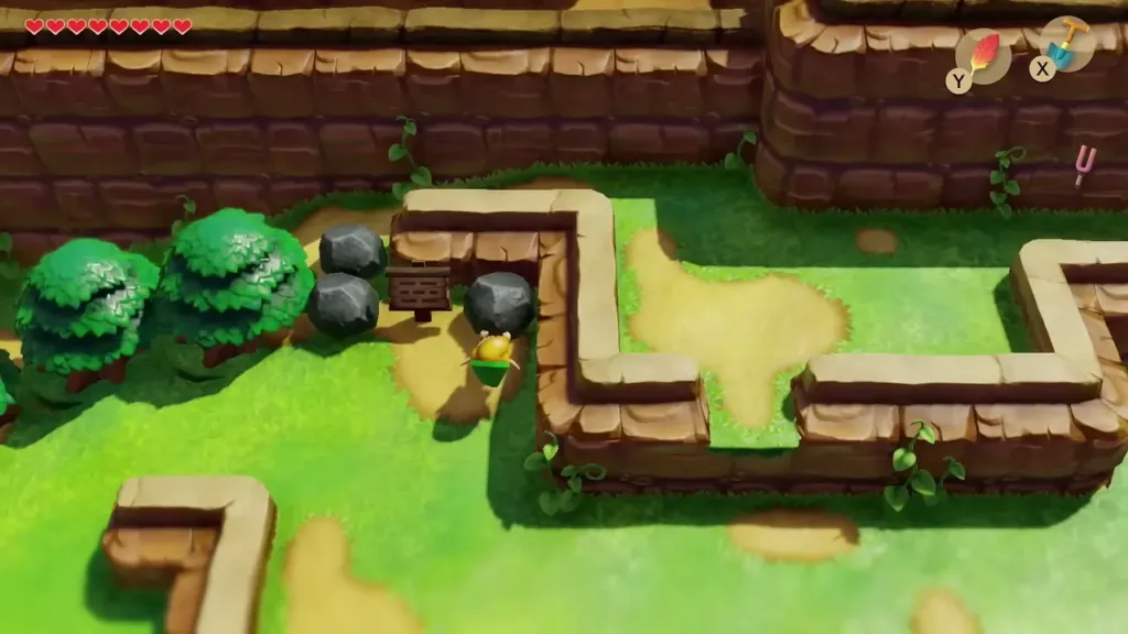 Link lifting a rock beside the signpost on Tal Tal Heights