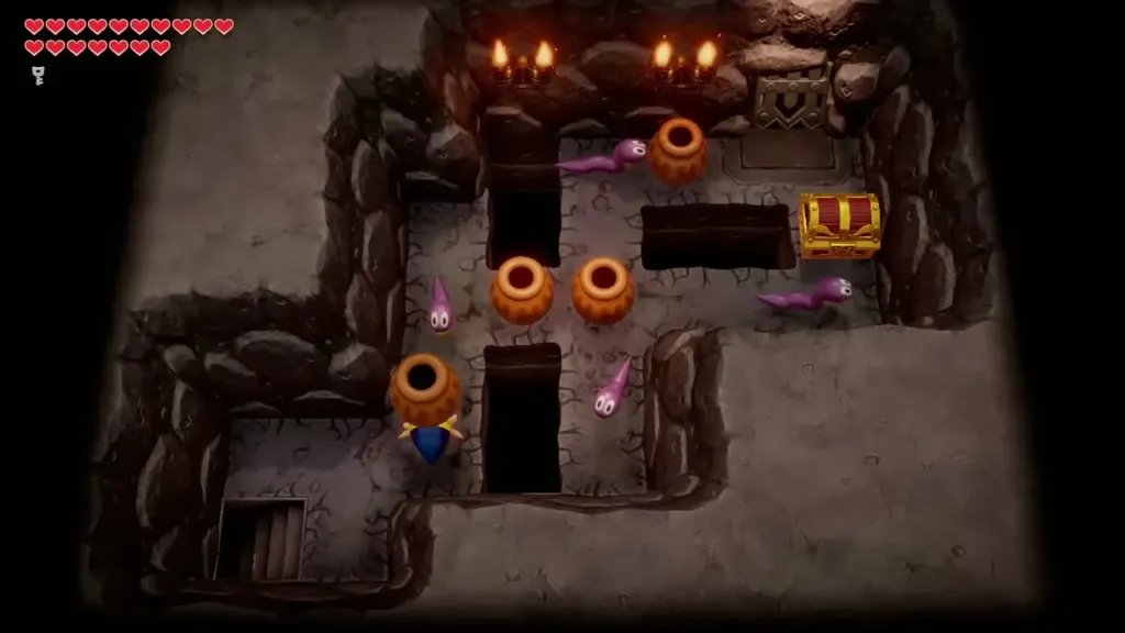 The chest room with pits, pots and purple snakes around Link The chest room with pits, pots and purple snakes around Link