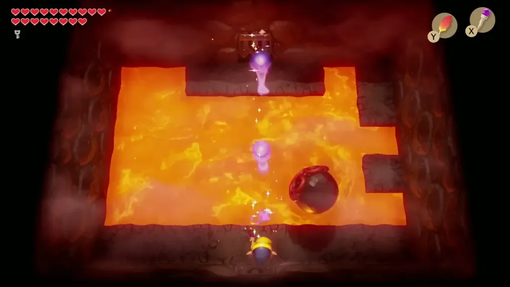 Link firing Magic Rod fireballs at Hot Head across the lava Link firing Magic Rod fireballs at Hot Head across the lava