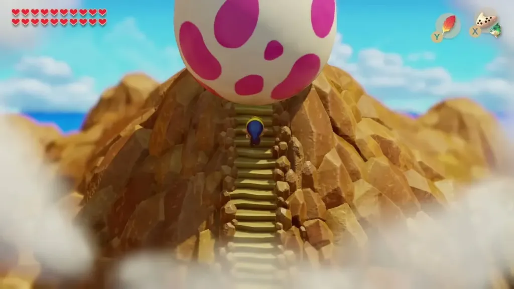 Link standing on the Mt. Tamaranch stairs facing the spotted Wind Fish's Egg