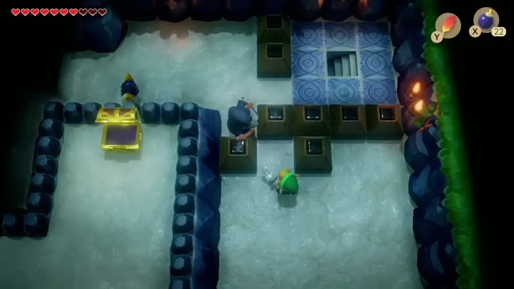 Link near switch blocks, a chest and stairs in a pale stone room Link near switch blocks, a chest and stairs in a pale stone room
