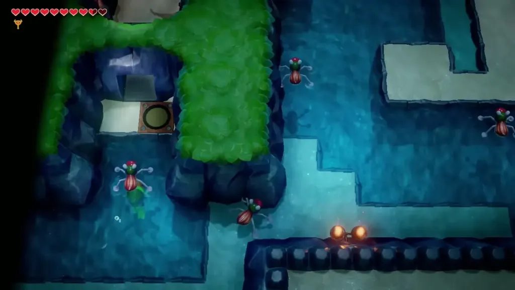Link swimming through the water past flying enemies toward the far ledge Link swimming through the water past flying enemies toward the far ledge