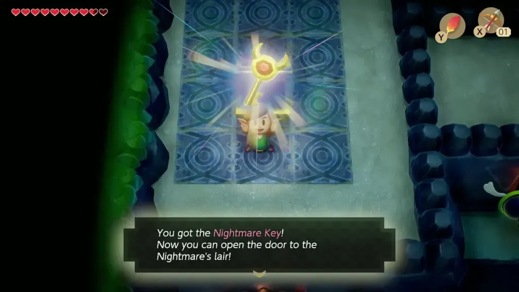 Link holding up the Nightmare Key above the blue-tile floor Link holding up the Nightmare Key above the blue-tile floor