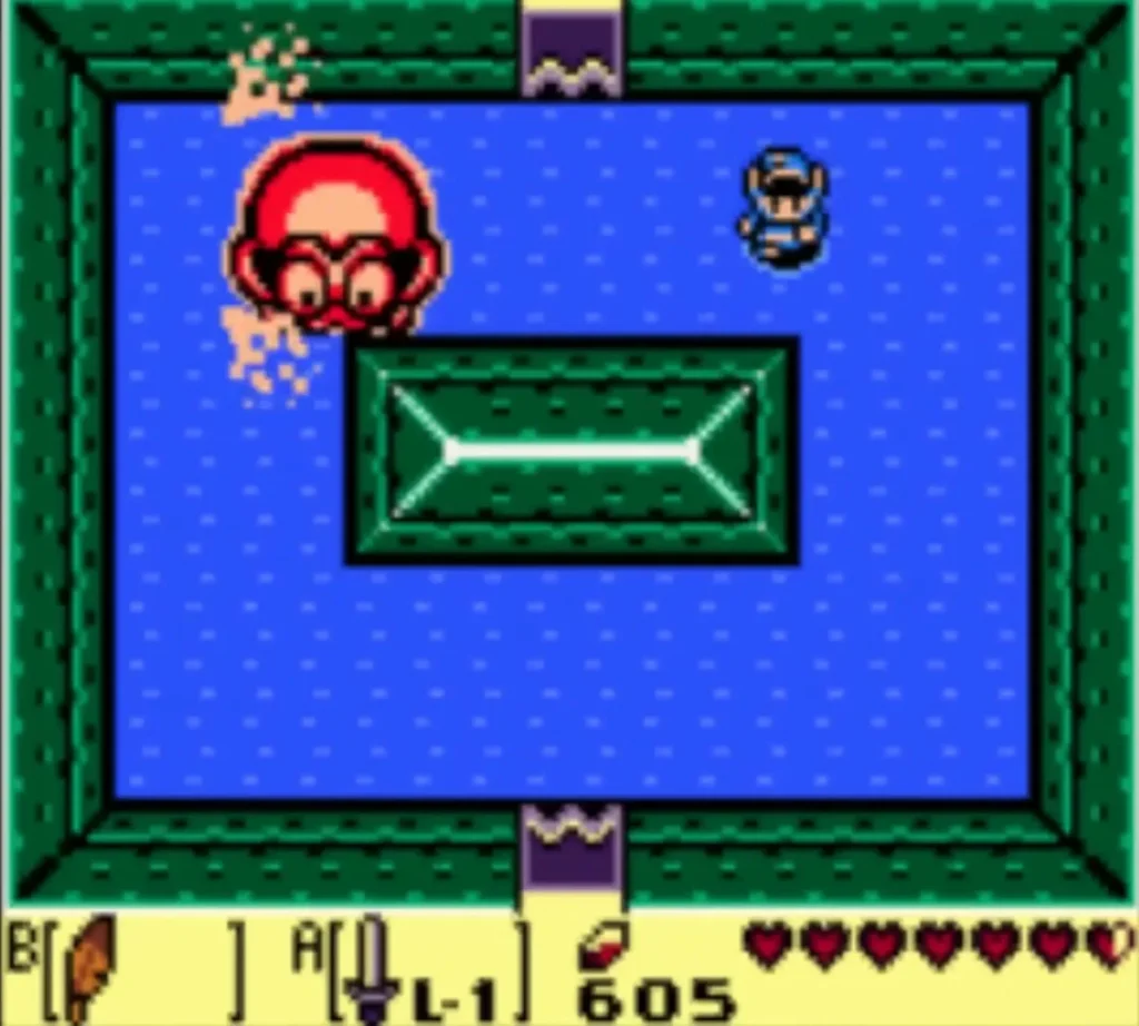 Angler Fish at the top-left of the water room shedding rocks while Link swims at the right