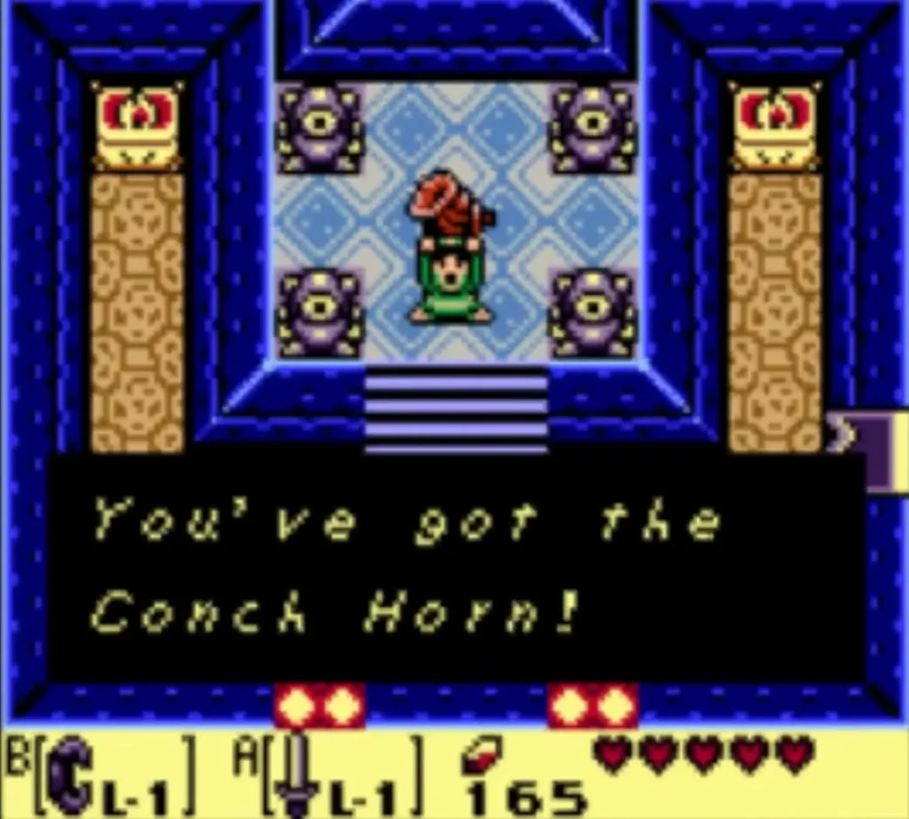 Link holds the Conch Horn with the You've got the Conch Horn message fully shown