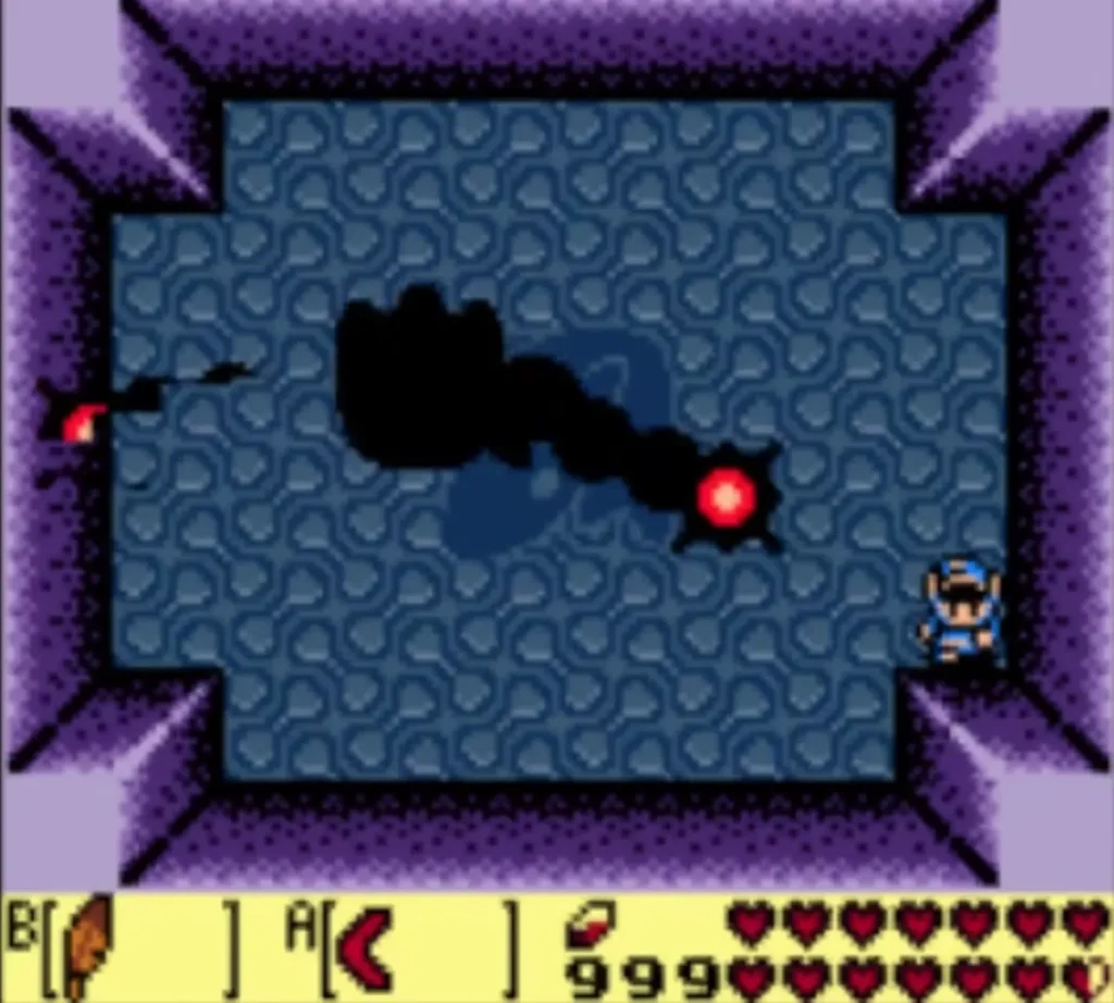 Long black arms with red spiked tips sweeping across the arena as Link stands clear