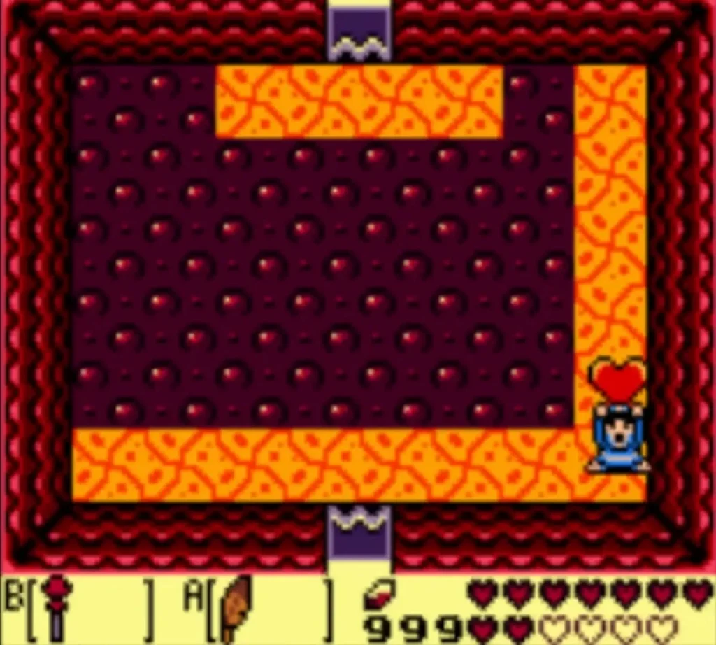 Link holds a Heart Container overhead in the lava room after the boss falls