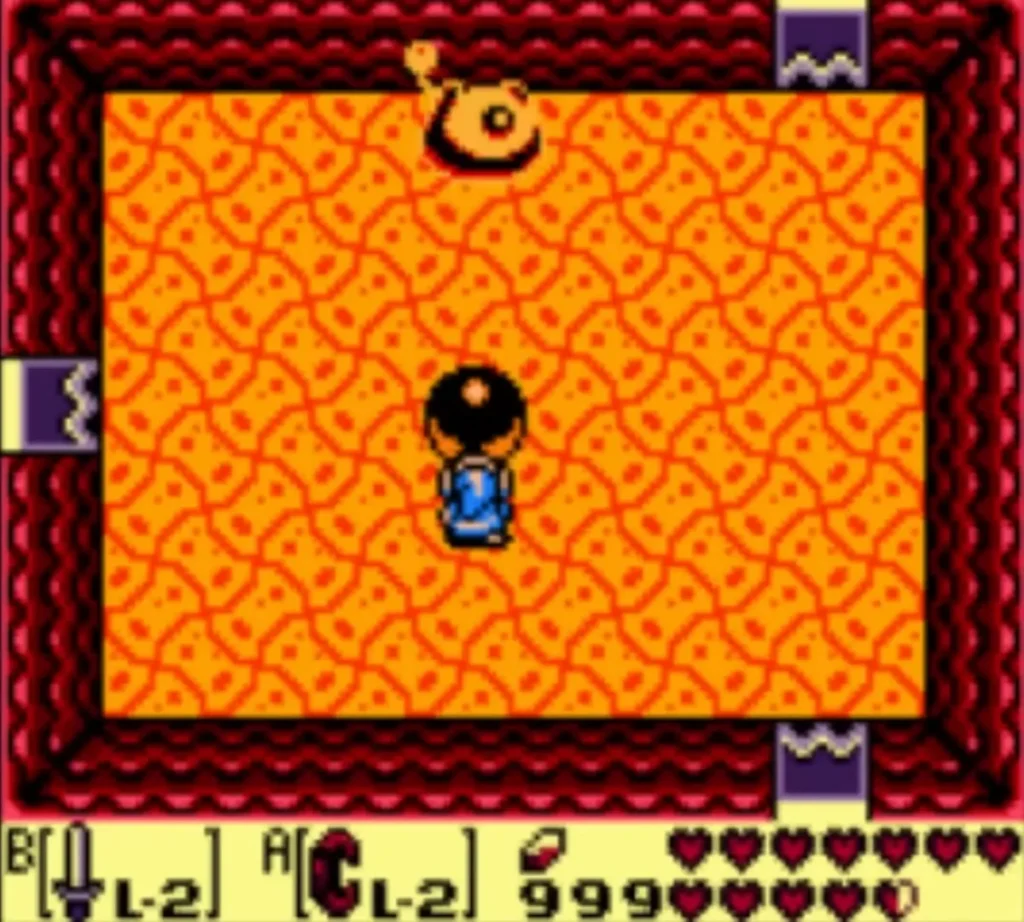 Link lifts the heavy iron ball over his head in the lava arena