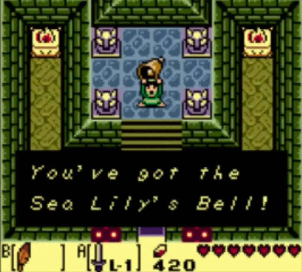 Link holding up the Sea Lily Bell, with its complete message box, after the Slime Eye