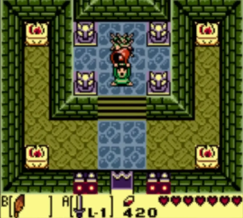 Link holds a Heart Container overhead in the octagon room after the Slime Eye falls